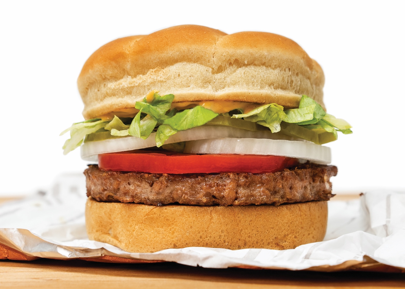 Photo of Beyond Burger sitting on wrapper.